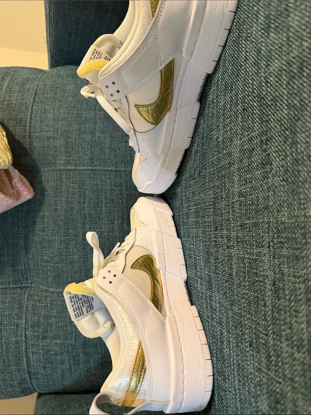 Nike Women’s White and Gold Low-Top Sneakers with Metallic Swoosh